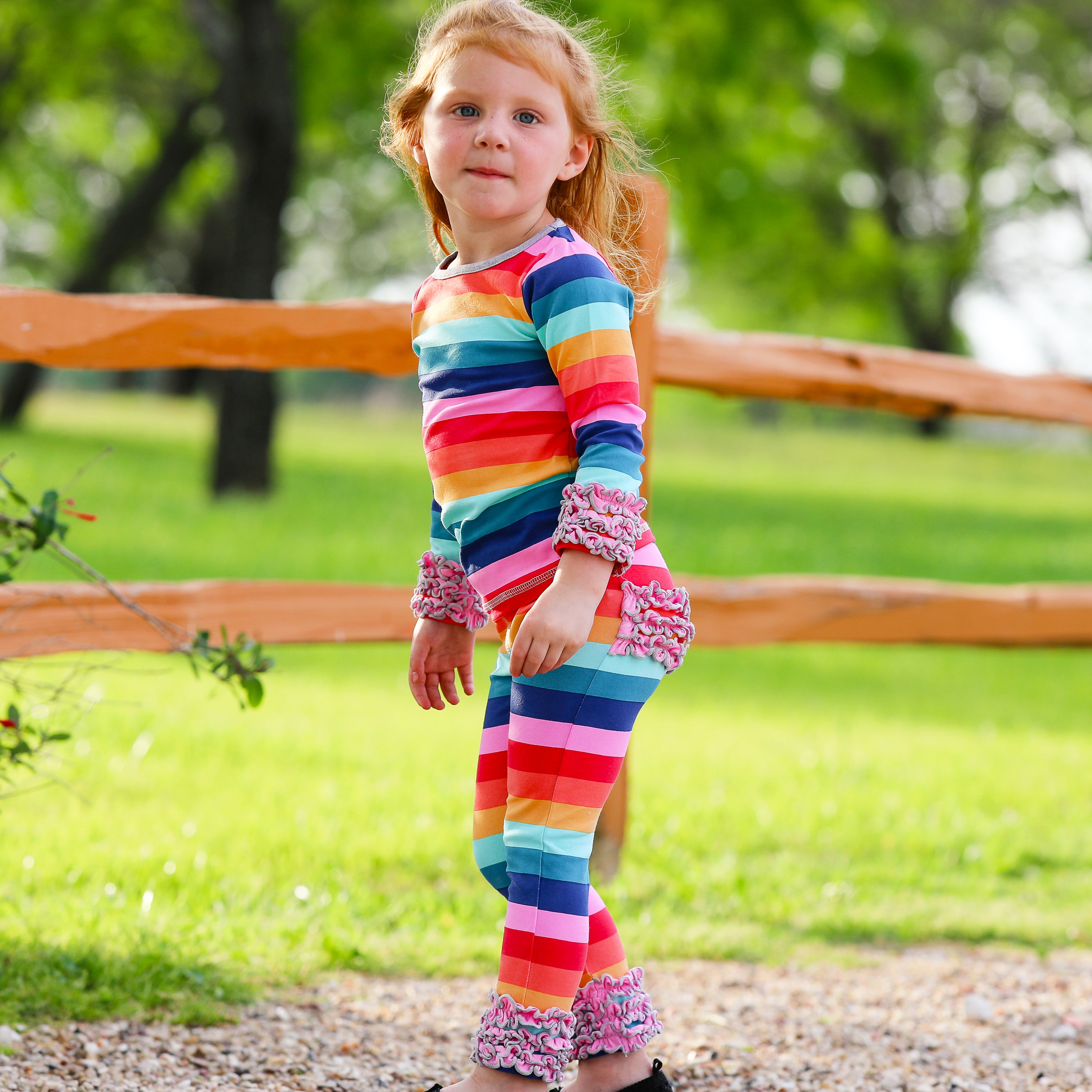 AnnLoren Rainbow Ruffle Butt Leggings for girls, featuring ruffles on the butt and ankles, made from soft Egyptian cotton.